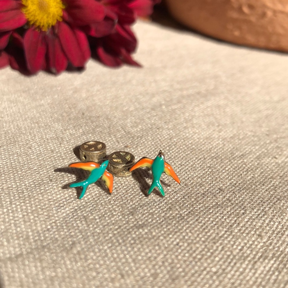 Fossil raven earrings